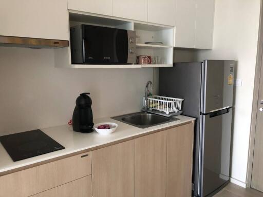 Modern kitchen with stainless steel appliances