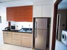 Modern kitchen with stainless steel appliances