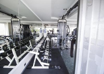Modern home gym with a variety of exercise equipment