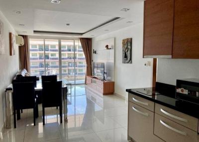 Modern living room with dining area and kitchenette