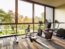 Home gym with exercise equipment and a view of the outdoors