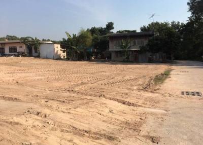 Empty lot with potential for development near established houses