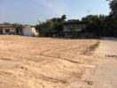 Empty lot with potential for development near established houses