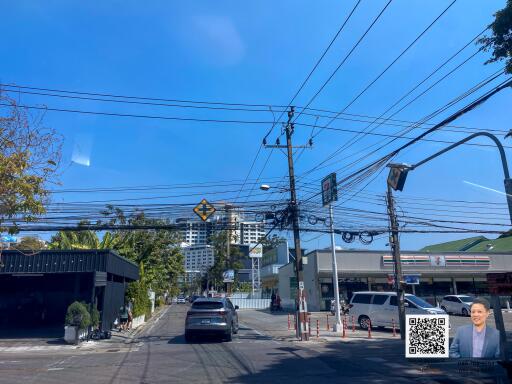 Street view with electrical pole and power lines