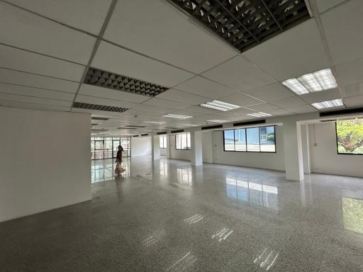 Spacious open-plan commercial space with bright lighting
