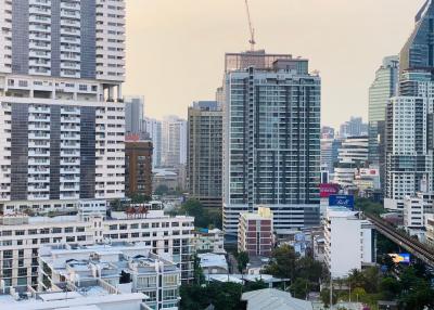 City skyline with multiple residential and commercial buildings