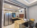 Modern kitchen with LED lighting and marble countertops