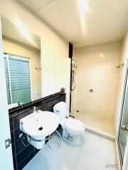 Modern bathroom with shower and natural lighting