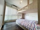 Modern bedroom with large bed and natural light