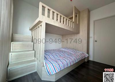 Modern bedroom with a bunk bed and hardwood flooring