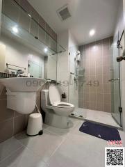 Modern bathroom interior with white fixtures