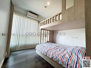Contemporary bedroom with large window and bunk bed