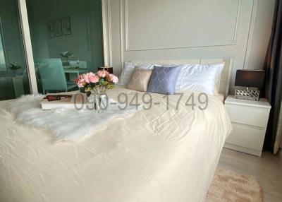 Cozy bedroom with large bed and elegant decor