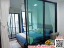 Cozy bedroom with glass sliding door and balcony access