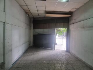 Spacious empty commercial space with large front entrance