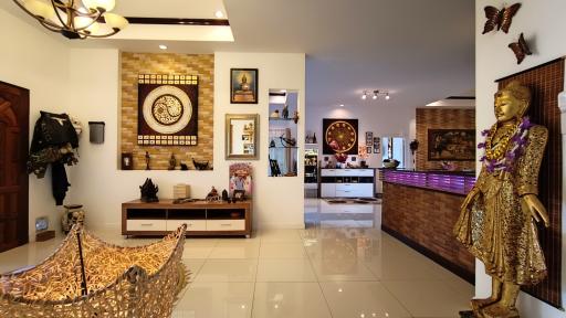 Spacious and artistically decorated living room with cultural decor