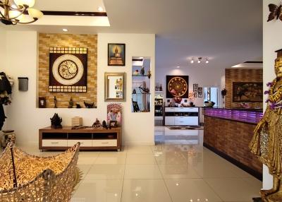 Spacious and artistically decorated living room with cultural decor