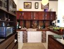 Contemporary styled kitchen with wooden cabinetry and modern appliances