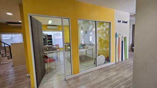 Bright commercial space designed for creative activities with colorful interior