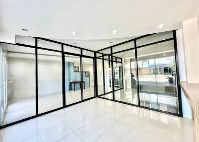 Spacious interior with large glass partitions and polished floor
