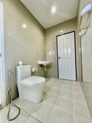 Clean modern bathroom with toilet and sink