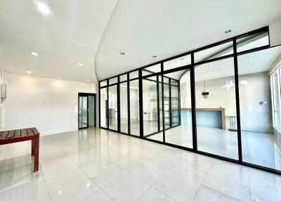 Spacious interior of a modern building with glass partition