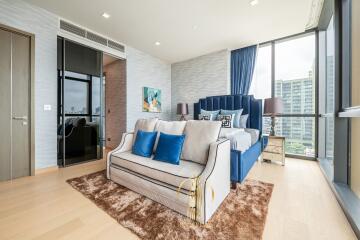 Modern living room with ample natural light and city view