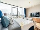 Modern bedroom with large windows and city view