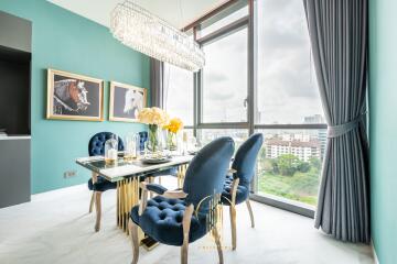 Modern dining room with large windows and city view