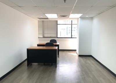 Spacious and well-lit office space with large windows