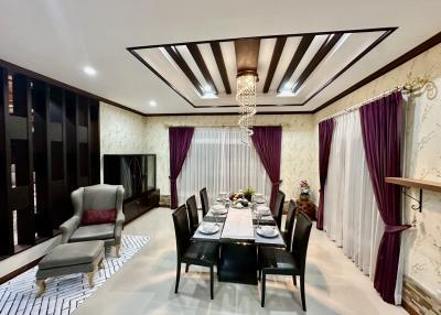 Elegant dining room with a large table and fashionable decor