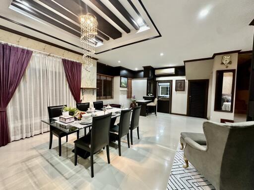 Elegant spacious living and dining area with modern lighting and interior design
