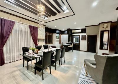 Elegant spacious living and dining area with modern lighting and interior design