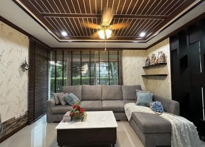 Spacious and modern living room with stylish decor and ample seating