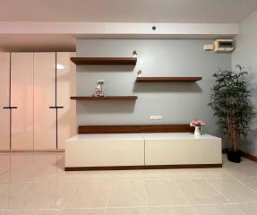 Modern living space with decorative shelving