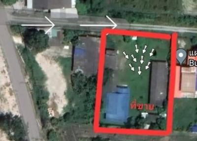 Aerial view of a residential property with marked boundary