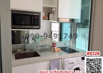 Modern kitchen with appliances and window view