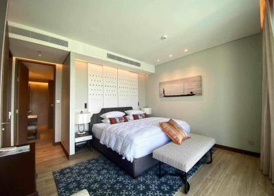 Modern bedroom with king-sized bed and elegant decor