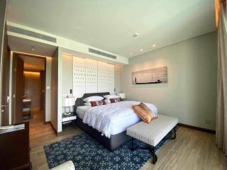 Modern bedroom with king-sized bed and elegant decor