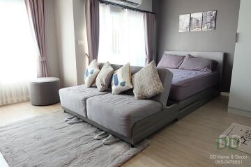 Modern bedroom with well-appointed furnishings and decor