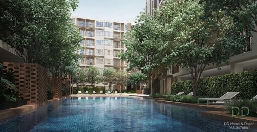 Luxurious residential building with a swimming pool and greenery