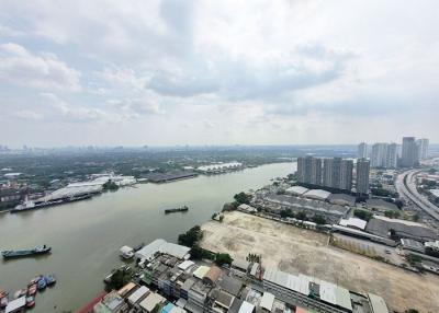Panoramic high-rise view of a river and cityscape