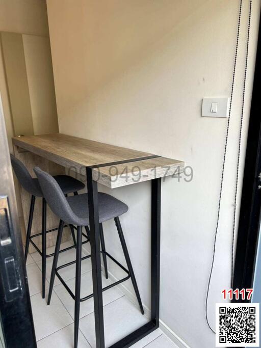 Compact kitchen counter with bar stools