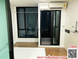 Modern bedroom with sliding glass door and air conditioning unit