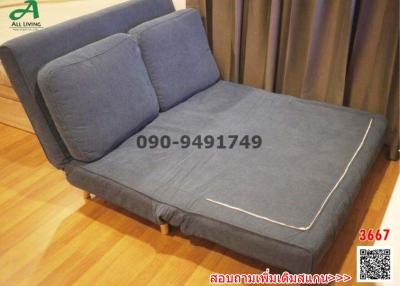 Fold-out sofa bed in a modern living room