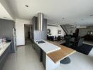 Modern kitchen with open layout leading to the dining area