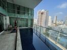Spacious balcony with private pool and city view