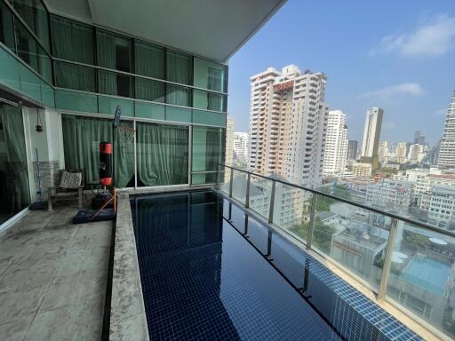 Spacious balcony with private pool and city view