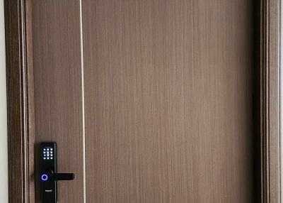 Modern brown door with an electronic keyless door lock system