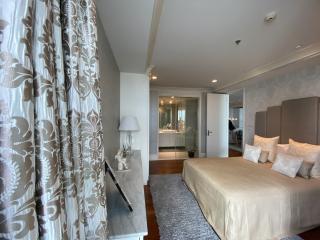 Spacious bedroom with en-suite bathroom and modern decor